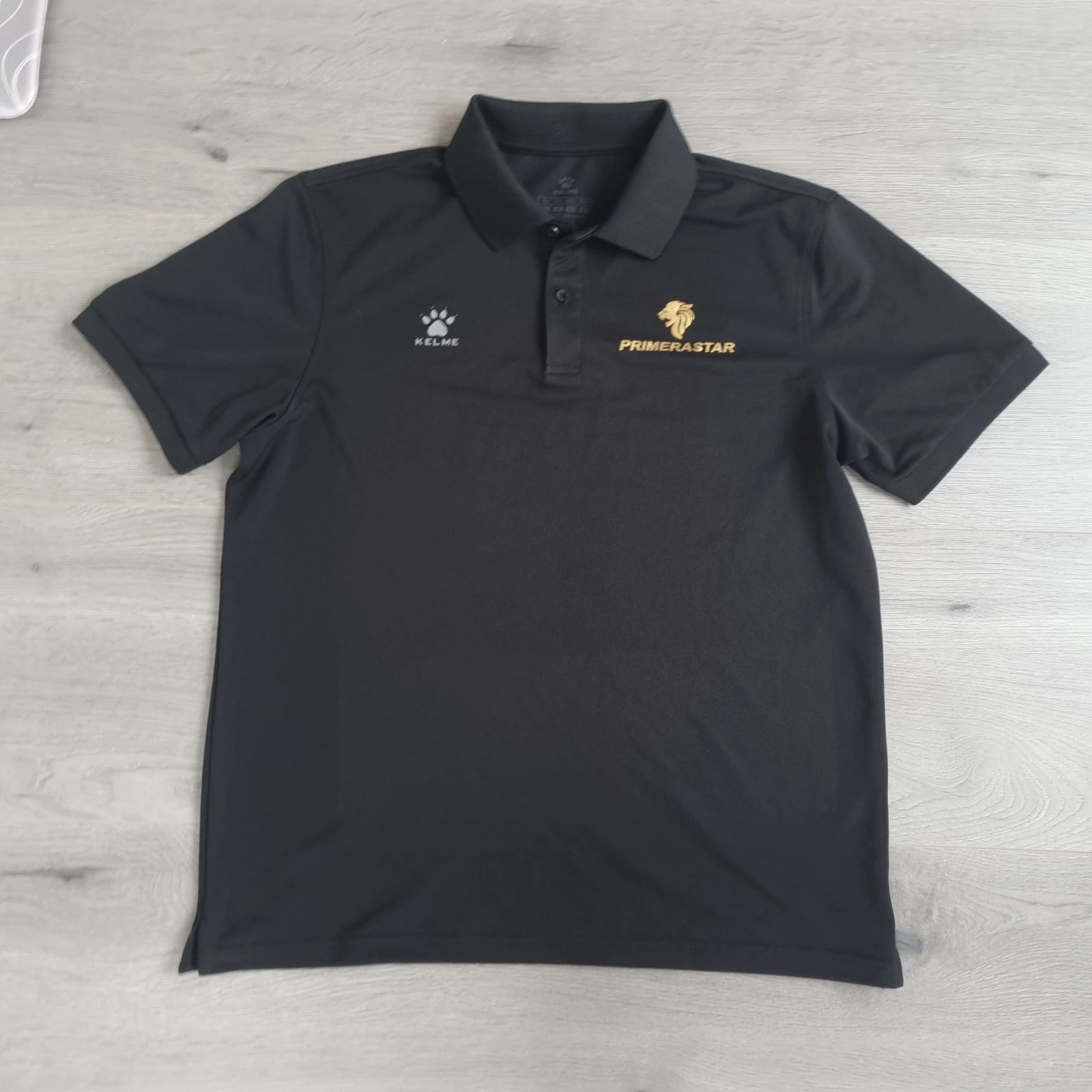 Zwart KELME Sport Poloshirt – Primerastar Gold Logo – Maat L / XL